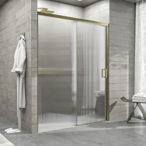 Mampara de ducha NOVUM frontal 1 fijo - 1 puerta corredera vidrio acanalado 6 mm.  ORO MATE