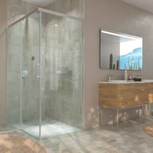 Mampara de ducha rectangular BASIC apertura frontal 1 fijo-1 puerta corredera+ 1 fijo . Sin perfil inferior. Con tratamiento anti-cal.Acabado CROMO BRILLO