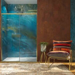 Mampara de ducha frontal BASIC 1 fijo -1 puerta corredera. Sin perfil inferior. Con tratamiento anti-cal . Acabado ORO MATE